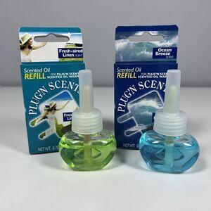 Plug’n Sented Oil Refills OCEAN BREEZE and FRESH AIRED LINEN Plug In Electric